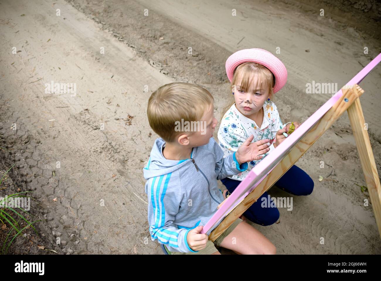 Children draw chalk on a blackboard Stock Photo - Alamy