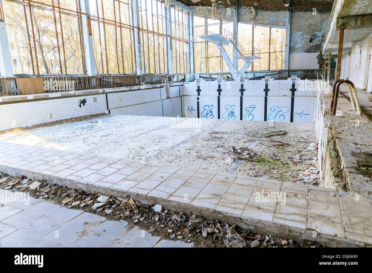 Ukraine, Pripyat, Chernobyl. Azure swimming pool and diving board