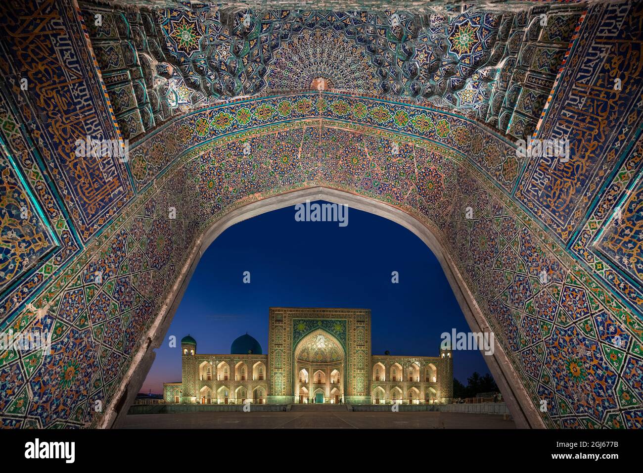 Central Asia, Uzbekistan, Samarkand. Mosque complex at night. Stock Photo