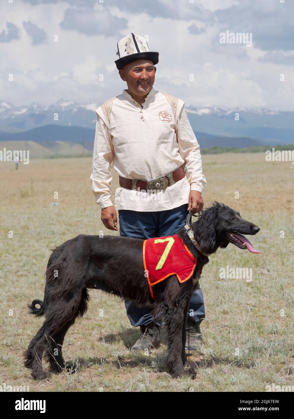 Breeders of Kyrgyz hunting dog, Taigan, during a competition. Folk
