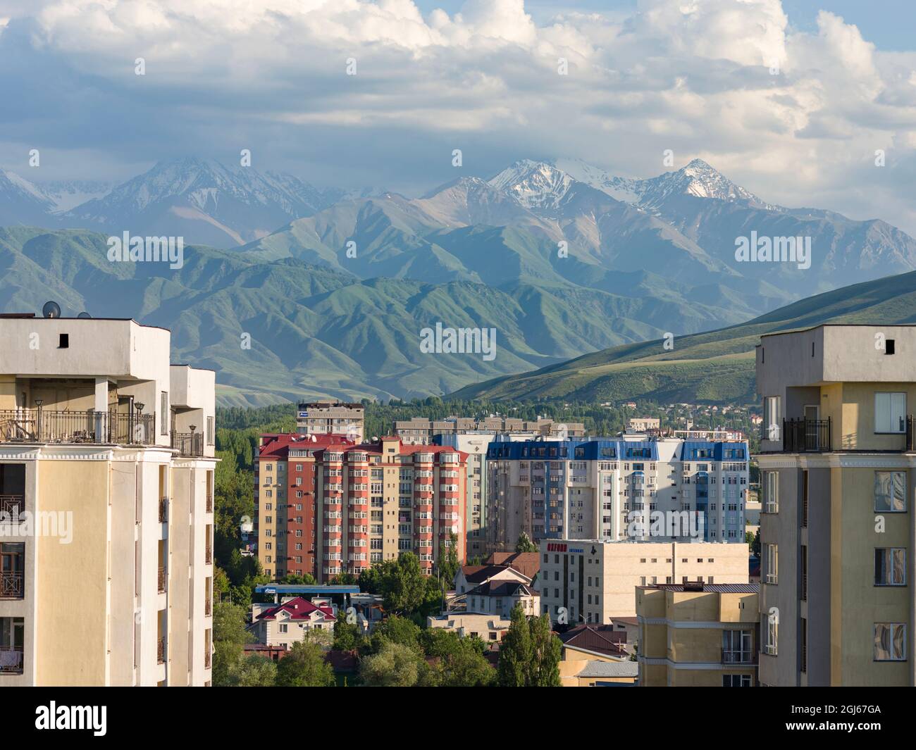 View of City view with modern high rise buildings, background the mountains of ...