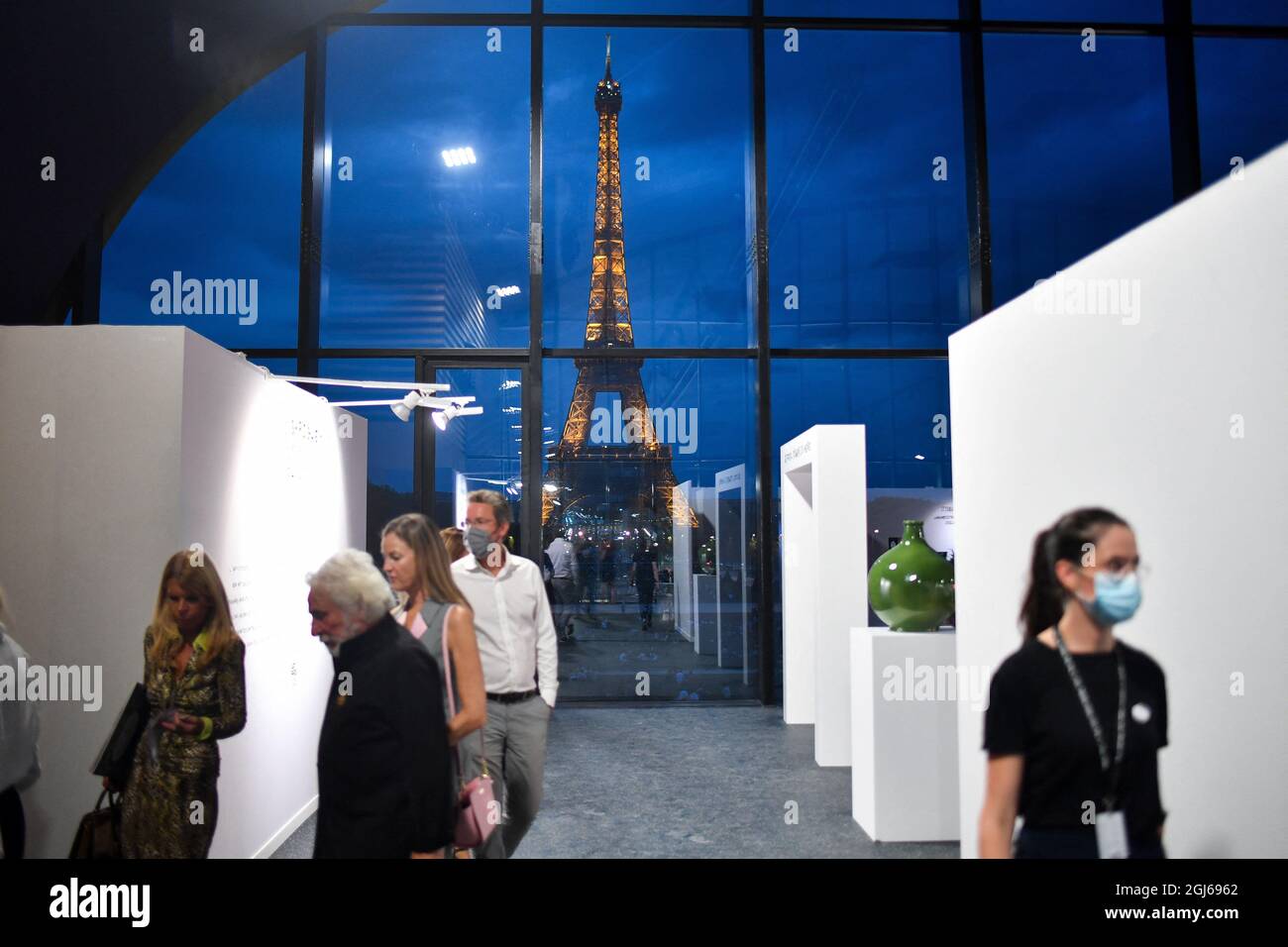 A view of the Art Paris fair held at Le Grand Palais Ephemere on September 8, 2021 in Paris, France. For the first time, Art Paris Art Fair marks the start of the new art year. The contemporary art fair, which is usually held in the spring, starts on Thursday and is held in the ephemeral Grand Palais, a new structure designed by architect Jean-Michel Wilmotte on the Champ-de-Mars. For its 23rd edition, it hosts 140 galleries, which offers a glimpse of the work of over 900 artists. As in previous years, the event provides an opportunity to (re)discover a broad panorama of modern and contemporar Stock Photo
