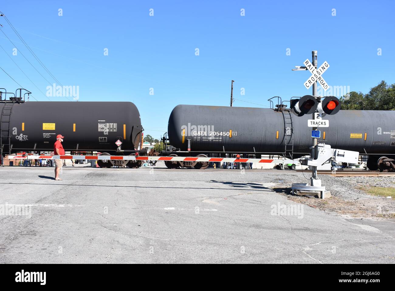 Folkston railroad tanker cars at street crossing Stock Photo