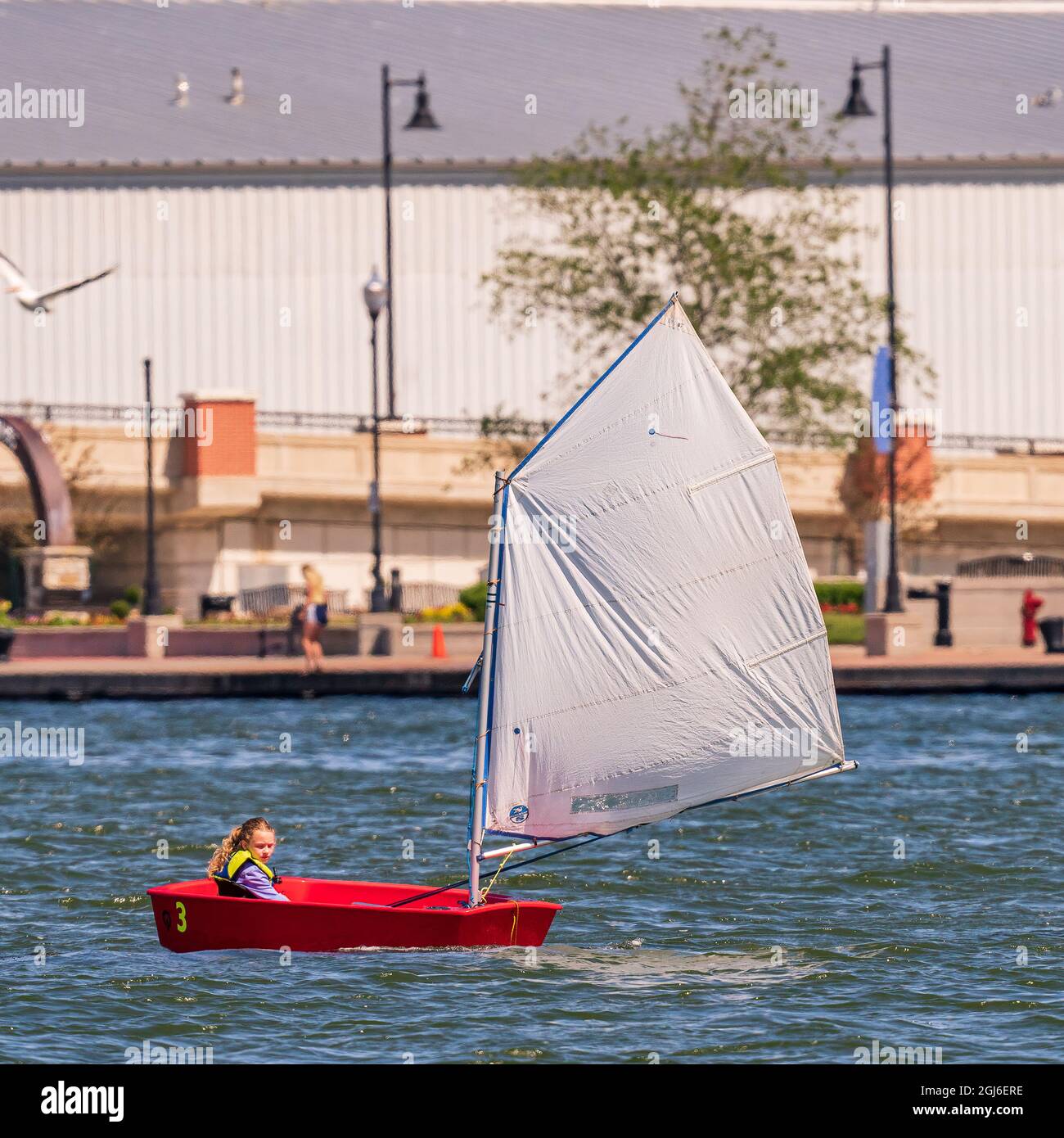 The sail training foundation holds youth sail training classes Fridays from May through October, in the channel between Lake Michigan and Green Bay. Stock Photo