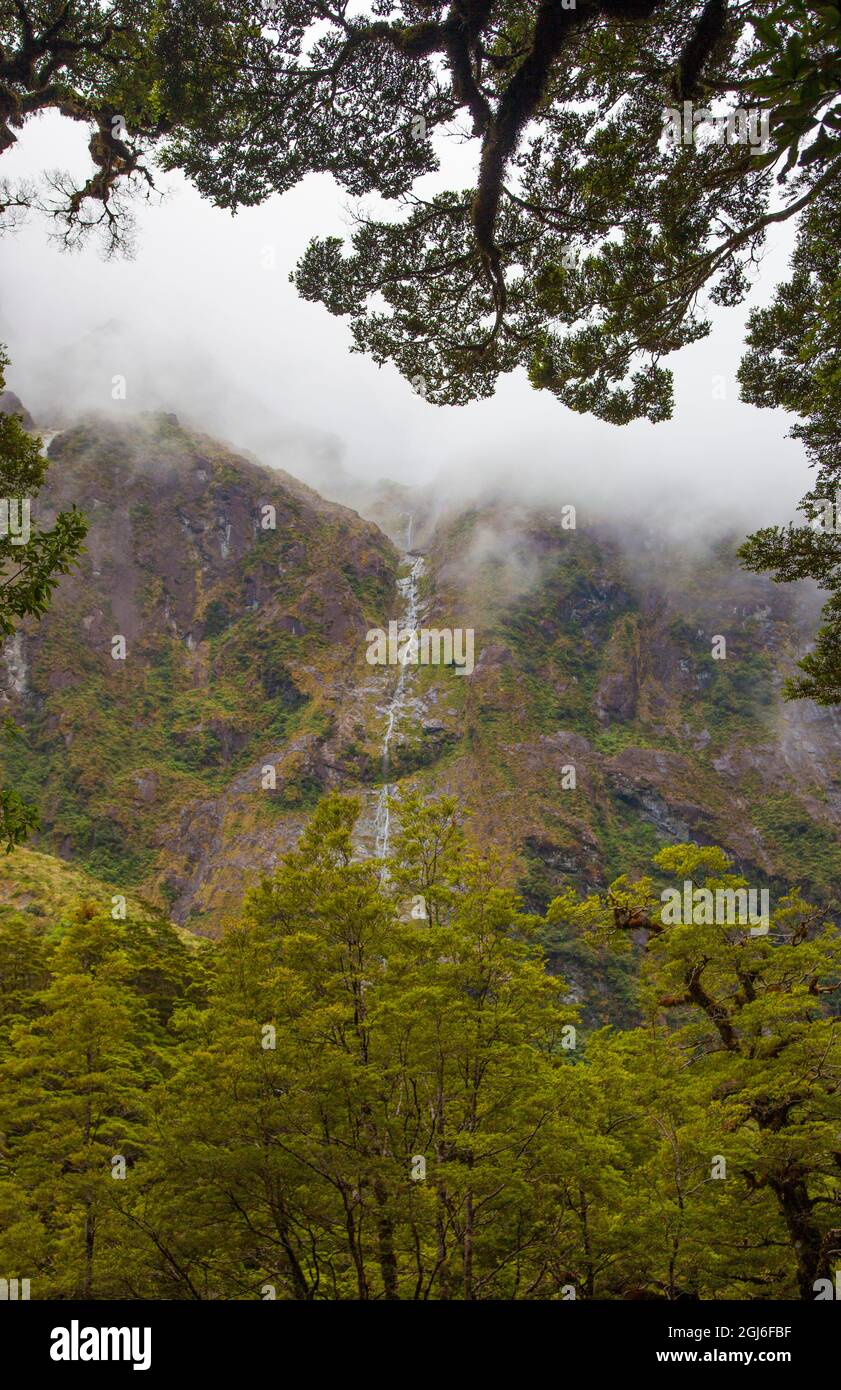 Waterfall flowing down mountain in New Zealand Stock Photo - Alamy
