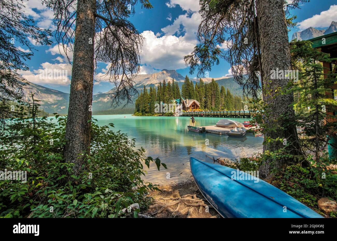 Blue canoe on shore of Emerald lake in Yoho National Park, Canada Stock