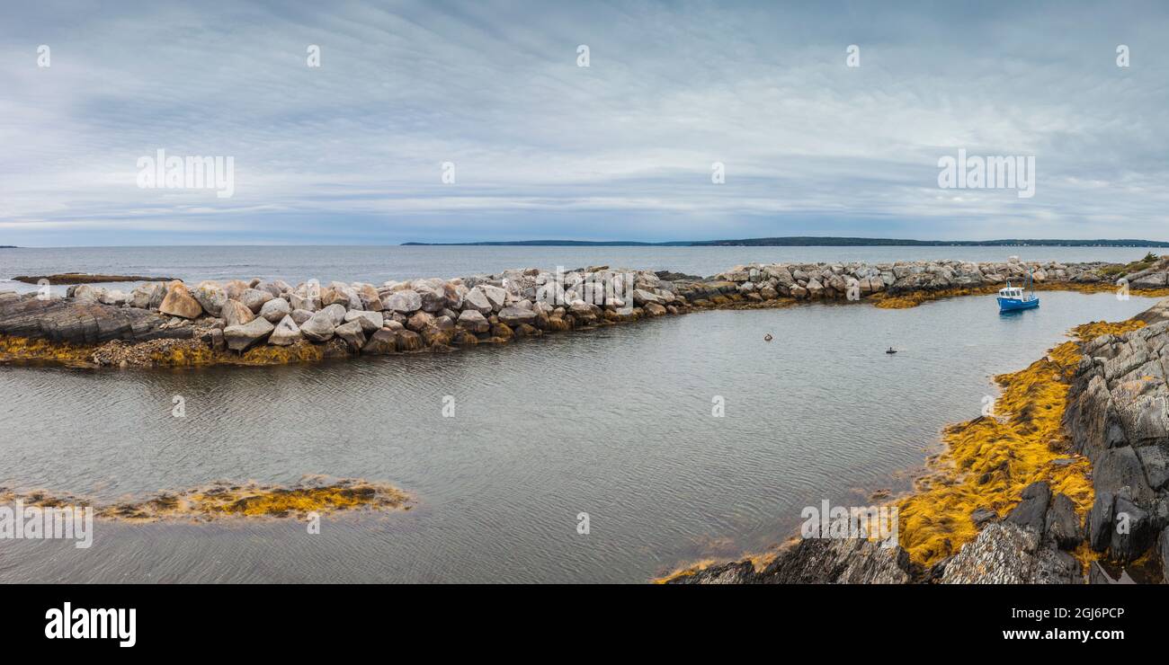 Canada, Nova Scotia, Blue Rocks, coastal fishing village, small boat in ...