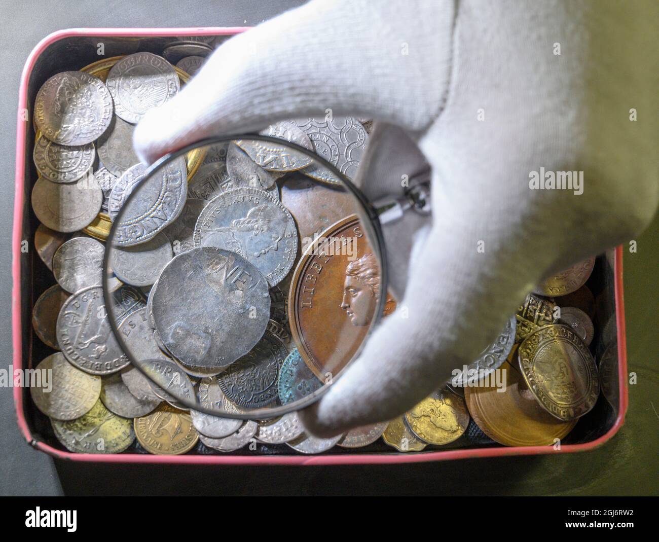 Morton & Eden, London, UK. 9 September 2021. A vintage sweet tin of coins  in Morton & Eden's Autumn sale includes several interesting early pieces  from the American Colonial period. An ancestor