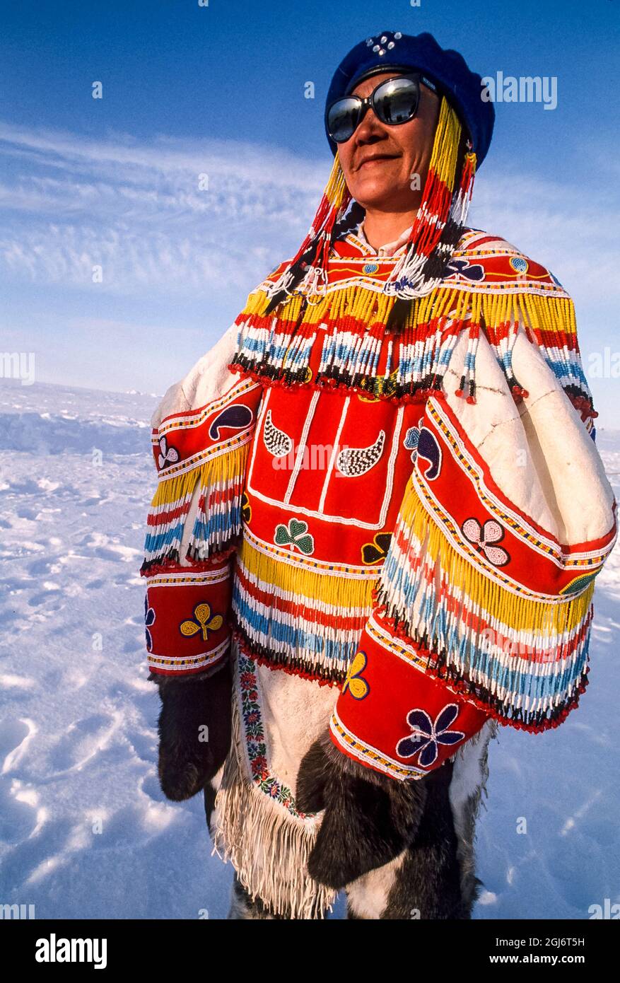 Baker Lake, Nunavut, Canada. Inuit woman wearing ceremonial amauti (parka).  Handmade of caribou skin and beads. (Editorial Use Only Stock Photo - Alamy