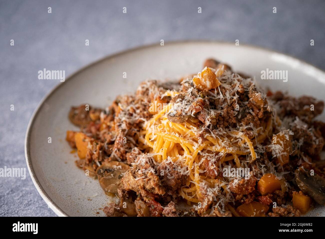 Spaghetti bolognese with permesan cheese Stock Photo