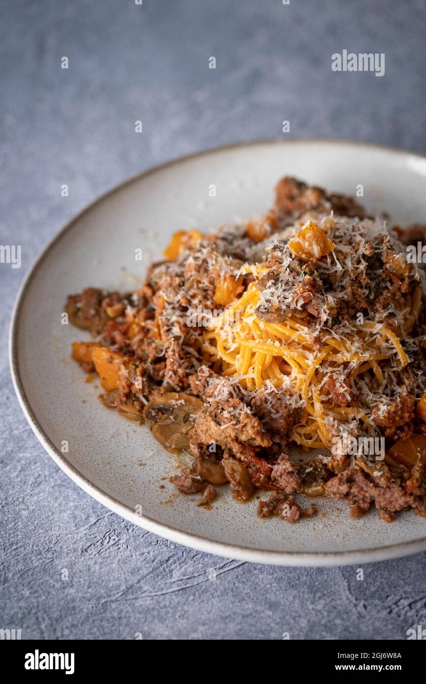 Spaghetti bolognese with permesan cheese Stock Photo