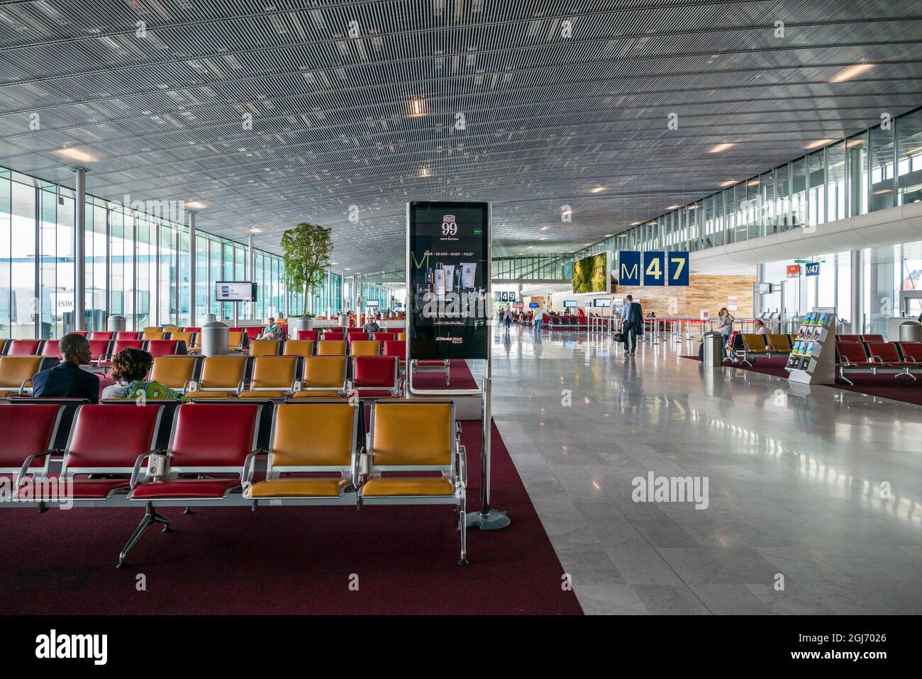 France, Paris. Chares DE Gaulle Airport, Aerogare 2, Terminal E, flight gates. Stock Photo