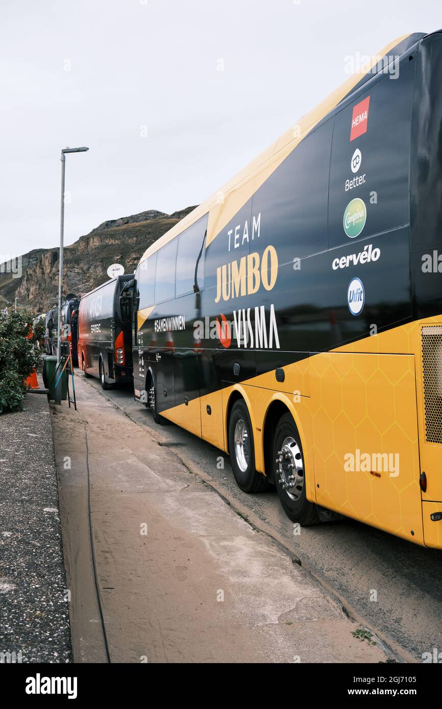 Team Buses gathered on West Shore, Llandudno for the finish of the Tour of Britain 2021 Stage 4 Stock Photo