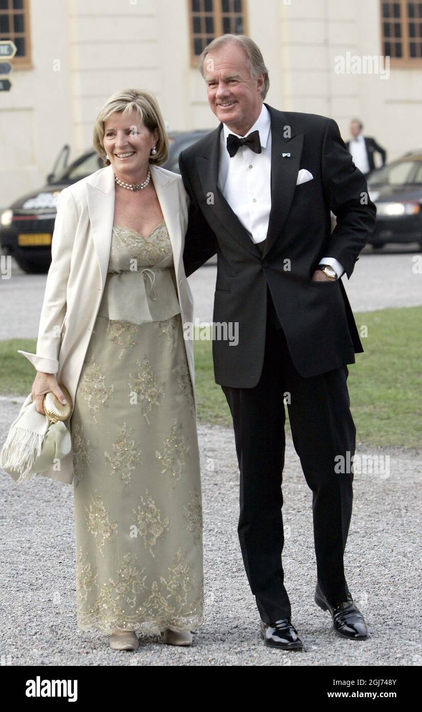 Global retail giant H&M owner Stefan Persson with wife Denise  arrives to King Carl Gustaf's private dinner celebration at the Drottningholm Palace outside Stockholm, Sweden, April 29, 2006. 300 guests were invited to the private dinner Saturday. King Carl Gustaf of Sweden officially celebrates his 60th birthday on his birthday Sunday the 30th of April.   Stock Photo