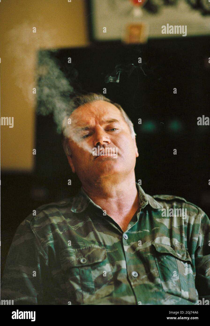 Ratko Mladic, Supreme Commander of the Serbian forces in Bosnia during the war, exhales some jcigarrete smoke during an interview in Han Pijesak, Bosnia Stock Photo