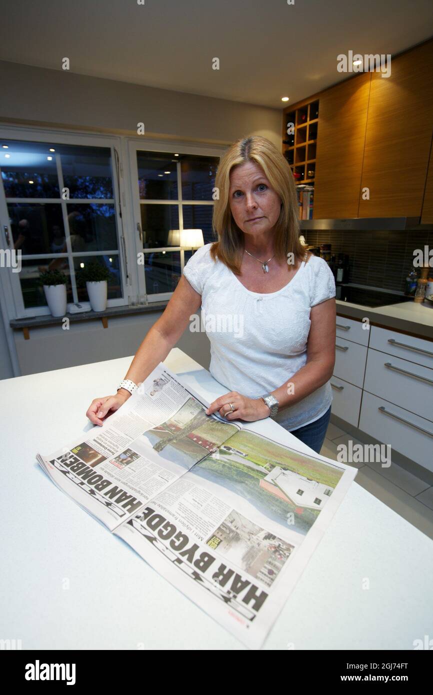 STOCKHOLM 20110725 Anna Odhe is an executive is reading a newspaper