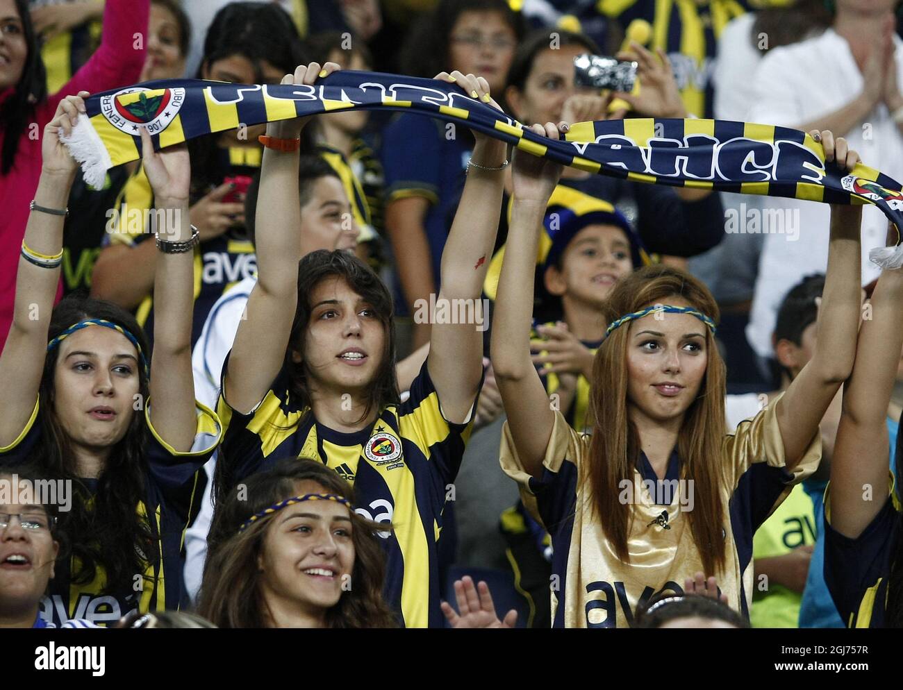 ISTANBUL 2011-09-20 More than 41,000 women and children filled Sukru Saracoglu Stadium to watch Fenerbahce play against Manisapor in Turkish League soccer match in Istanbul, Turkey, Tuesday, Sept. 20. 2011. Turkey came up with a radical solution for tackling crowd violence at football matches ban the men and let only women and children in. Under new rules approved by Turkey's football association, only women and children under the age of 12 will be admitted to watch games for free involving teams which have been sanctioned for unruly behavior by their fans. Fenerbahce was ordered to play two h Stock Photo