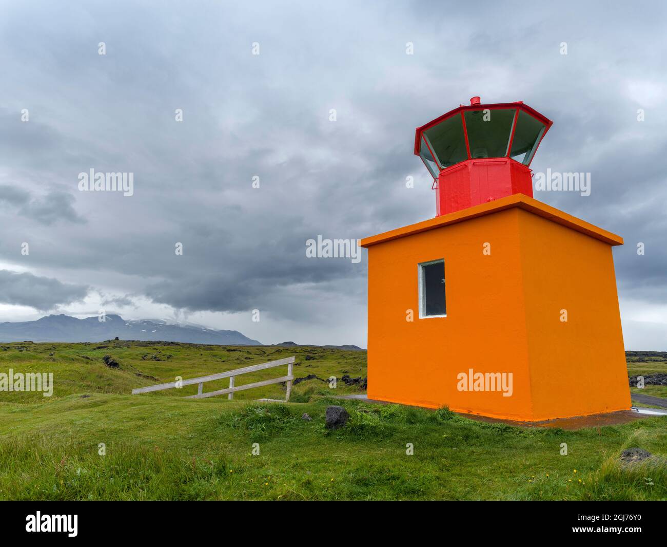 lava flow at coast with lighthouse at Ondverdarnes. Landscape on peninsula Snaefellsnes in western Iceland. (Editorial Use Only) Stock Photo