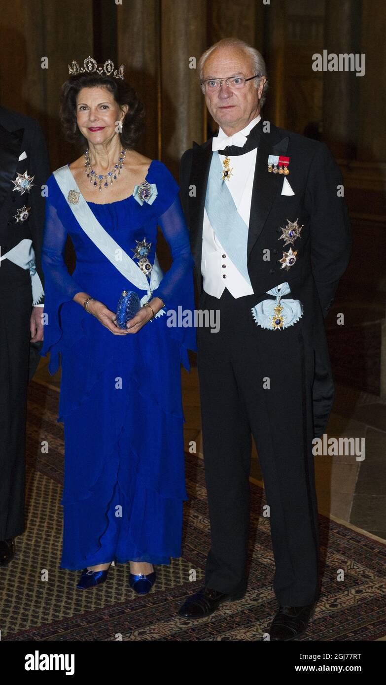 STOCKHOLM - 20111211 King Carl XVI Gustaf and Queen Silvia arrive to a gala dinner for the Nobel Laureates at Stockholm's Royal Palace Foto: Henrik Montgomery / SCANPIX Kod: 10060 Stock Photo