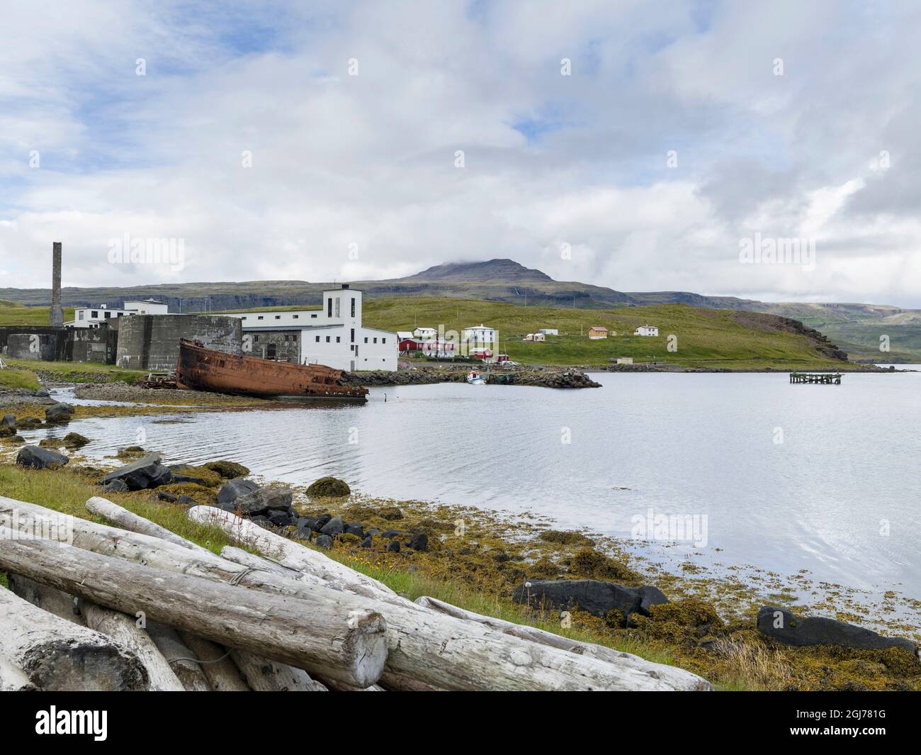 Landscape at Reykjarfjordur. The old fish factory and village Djupavik ...