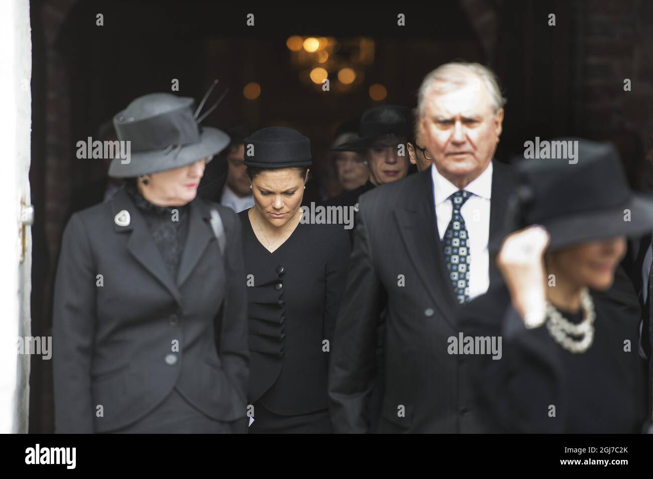 BASTAD 2012-05-14 Crown Princess Victoria is seen between Queen Margreth and Prince Consort Henrik of Denmark during the funeral of Count Carl Johan Bernadotte in the Maria Church in Bastad, Sweden, May 14, 2012. Foto: Suvad Mrkonjic / XP / SCANPIX / kod 7116 ** OUT SWEDEN OUT T ** Stock Photo