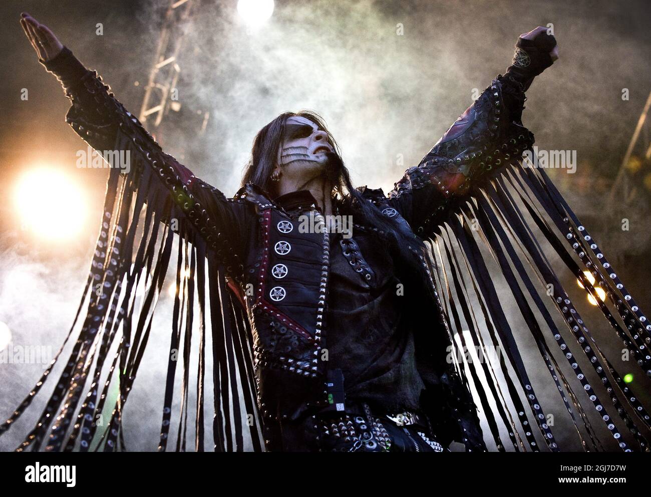 Shagrath (Dimmu Borgir) singing in a Country band wearing cowboy clothes. :  r/dalle2