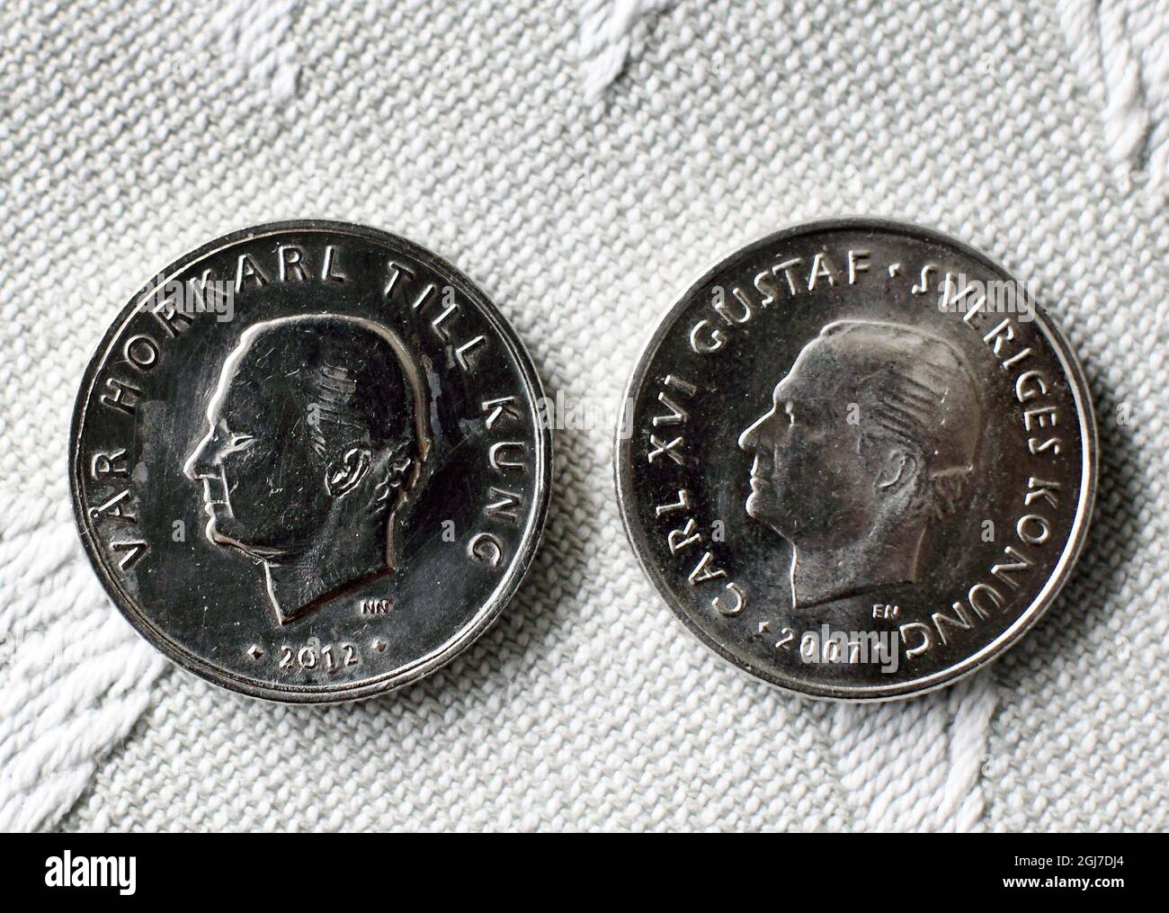 PITEA 20120614 Mrs. Karin Mattsson discovered a fake coin in Pitea, North  Sweden, June 13, 2012.The fake coinÂ´s to the left. The inscription on the  fake coin relates to the KingÂ´s alleged