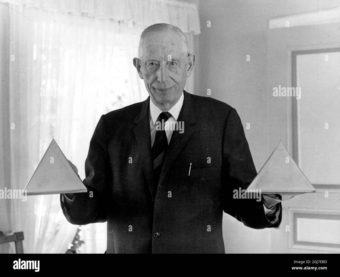 Ruben Rausing (c) founder of Tetra Pak holding two of the classic tetrahedron shaped packages, Tetra Classic., which required a minimum of material, while it was hygienic, Ruben Rausing med Tetra Pak-fÃ¶rpackningar Foto C.A.Raasum / Sydsvenskan / SCANPIX Stock Photo