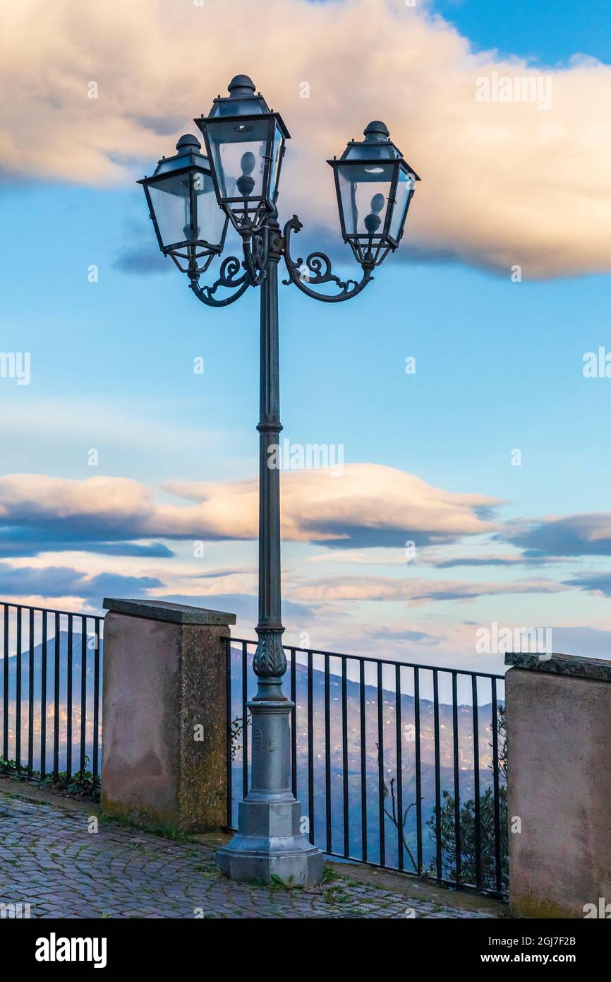 Europe, Italy, Sicily, Palermo Province, Pollina. Lamp post at sunset, at an overlook near the town of Pollina. Stock Photo