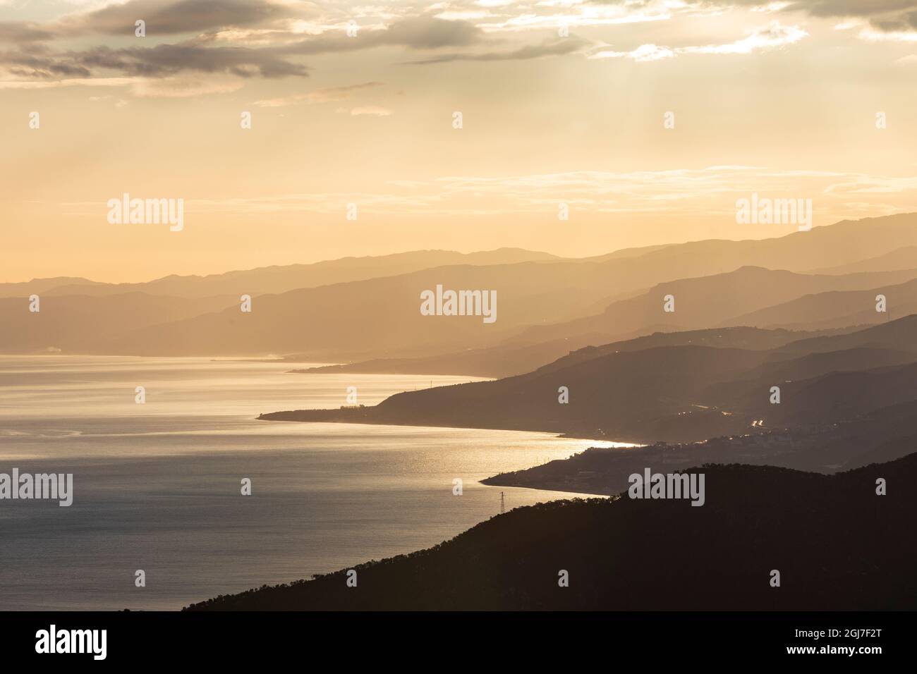 Italy, Sicily, Palermo, Pollina. Late afternoon view of the Sicilian coast from Pollina. Stock Photo