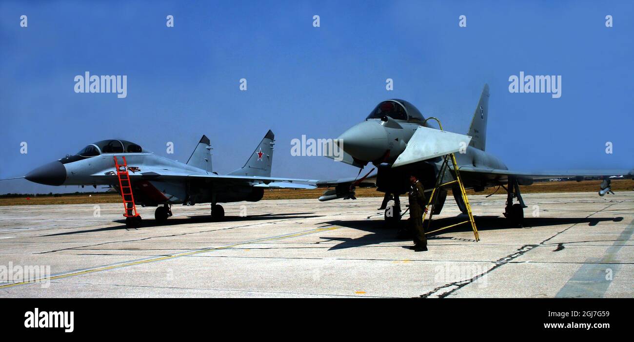 BELGRADE 2O12 -09-02 Russian air force MIG-29 MM2 (left) and Italian Air Force Eurofighter 2000 (right)  are seen during an army-military airshow in Batajnica,Serbia, September 2, 2012 Foto: Aleksandar Djorovic/ SCANPIX / Kod: 21085   Stock Photo