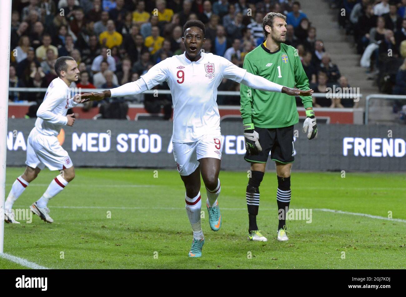 England's Daniel Welbeck celebrates after the 1-1 goal behind Sweden's goalkeeper Andreas Isaksson (right) during the friendly soccer match Sweden vs England at the new national soccer stadium 'Friends Arena' in Stockholm, Sweden Stock Photo