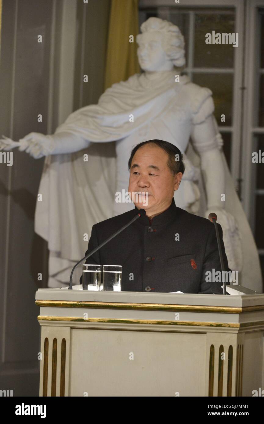 The 2012 Nobel Literature Prize laureate, Mo Yan of China get´s applause from members of the Academy after his traditional Nobel lecture Friday Dec. 7, 2012 at the Royal Swedish Academy. Stock Photo