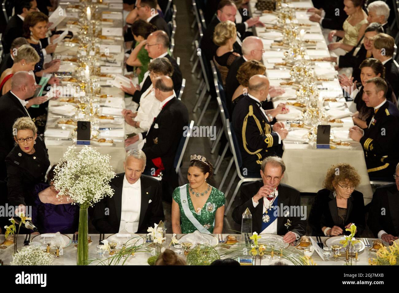 STOCKHOLM 2012-12-10 The guests at the honorary table, Brian K. Kobilka, Nobel Laureate in Chemistry,  Crown Princess  Victoria, Per Westerberg, Speaker of the House of Parliament, Claudine Haroche at the Nobel Banquet in the City Hall in Stockholm Sweden, December 10, 2012. Photo Jessica Gow  / SCANPIX code 10070   Stock Photo