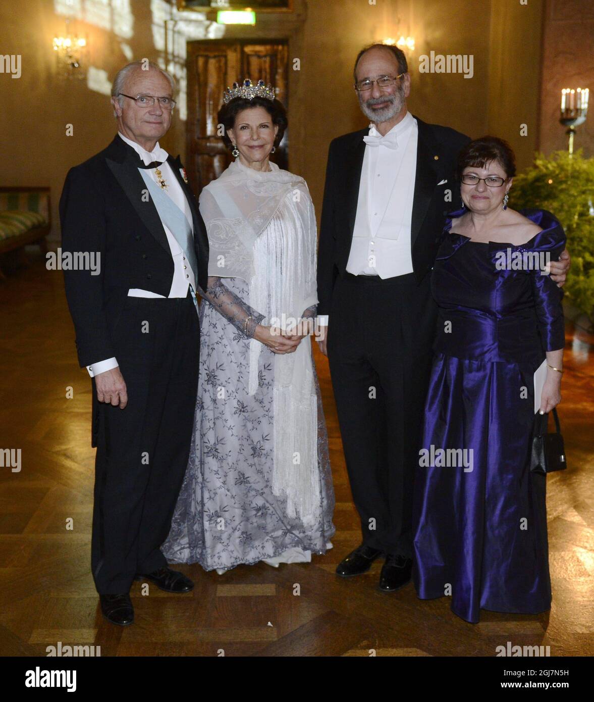 STOCKHOLM 2012-12-10 From left King Carl Gustaf, Queen Silvia, Alvin ...