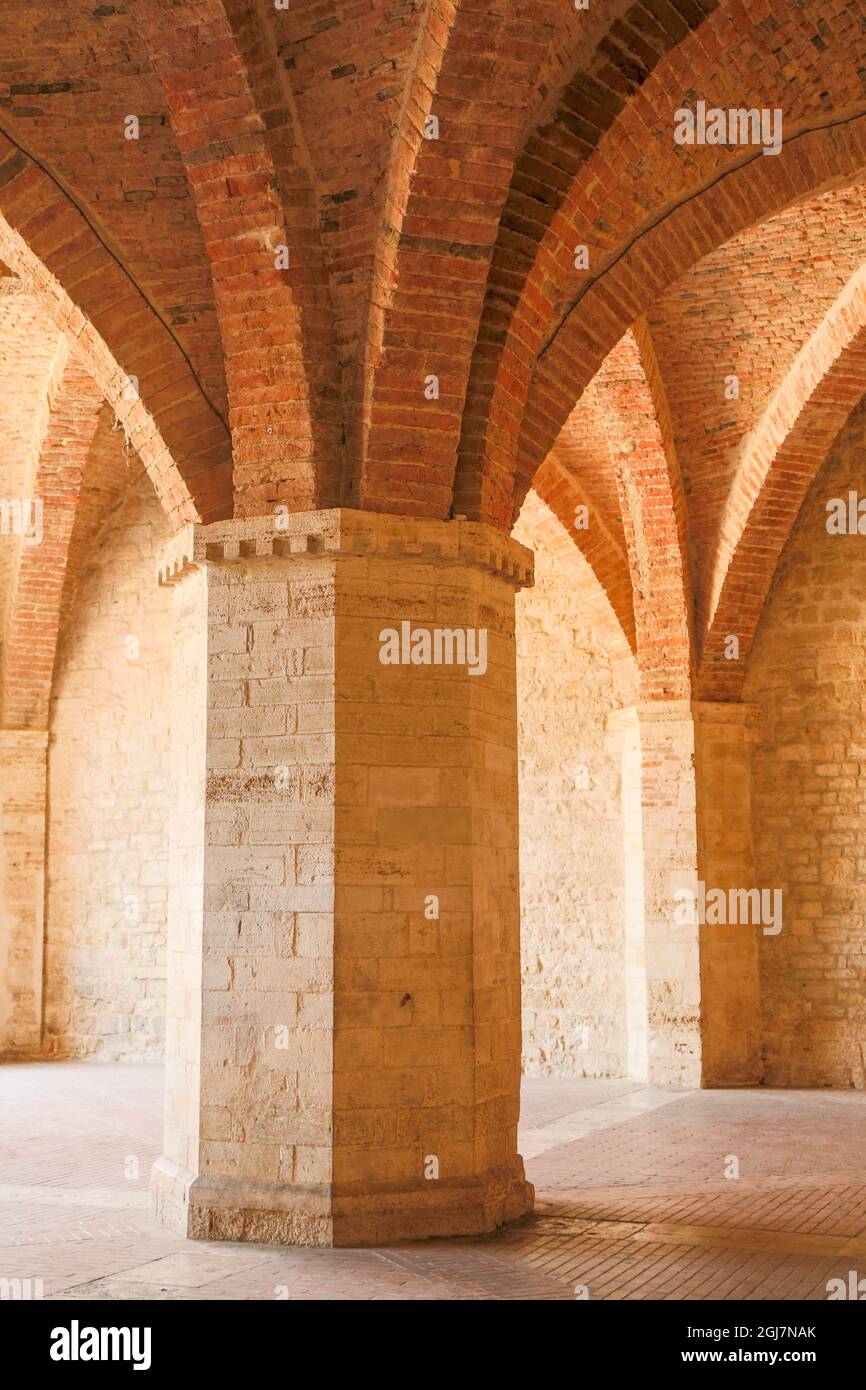 Todi, Umbria, Italy. Rib-vaulting and a column outside of The Monastery of Lucrezia. (For editorial use only) Stock Photo