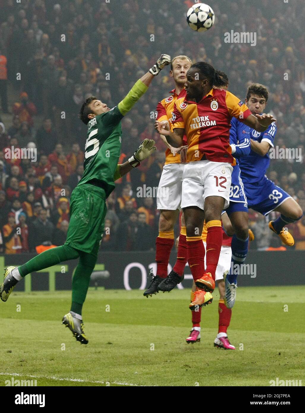 Galatasaray's Didier Drogba (centre) during their UEFA Champions League Round of 16 First Leg match Galatasaray between Schalke 04 at the TT Arena Ali Sami Yen Spor Kompleksi in Istanbul, Turkey on Wednesday 20 February 2013. Stock Photo