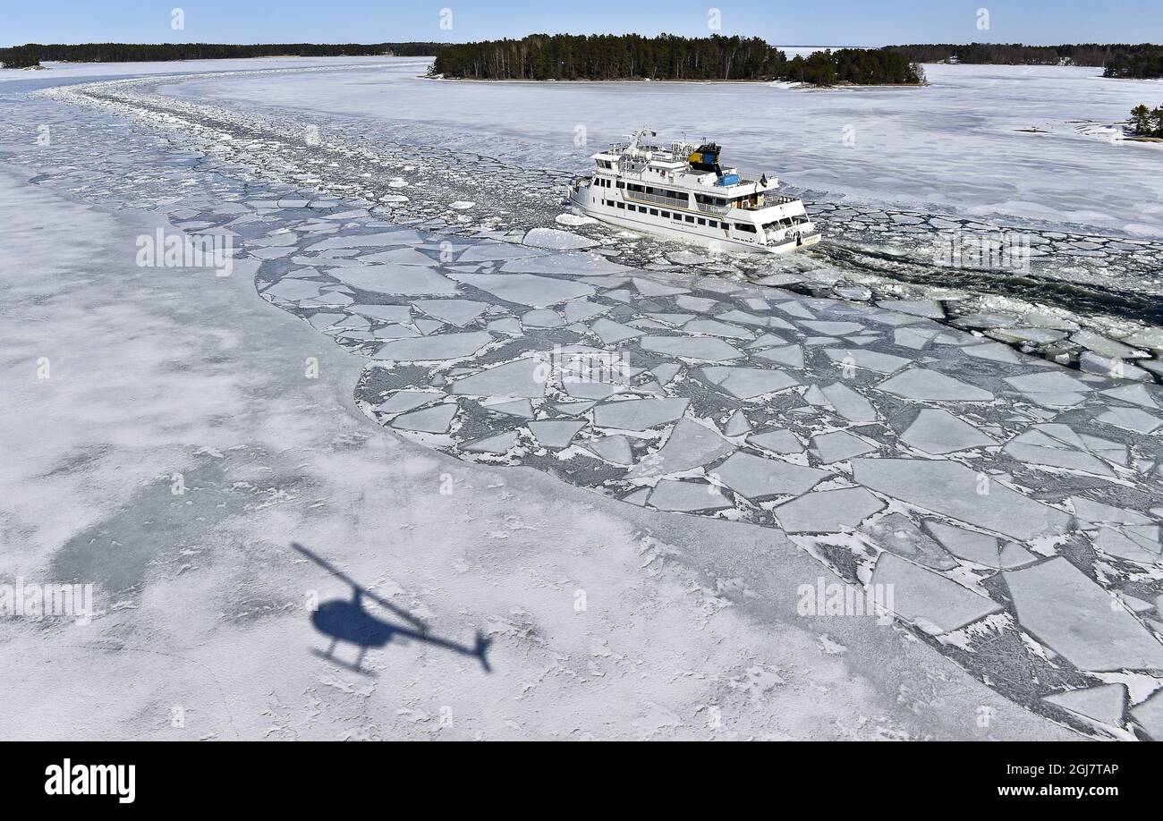 STOCKHOLM 2013-04-05 The ferry Soderarm is seen making its way through a broken ice channel to the island Husaro in StockholmÂ’s archipelago on Friday April 4, 2013. SMHI, the Swedish government agency on weather forecasts and climate, reports that there is a record spread of ice around SwedenÂ’s coasts this late in the winter. At first forecasters expected the ice on the Baltic sea to reach its maximum in late January, but a prolonged spell of high pressure that arrived over in early March caused new ice to form late in the season, resulting in the record-late date. Anders Wiklund / SCANPIX / Stock Photo