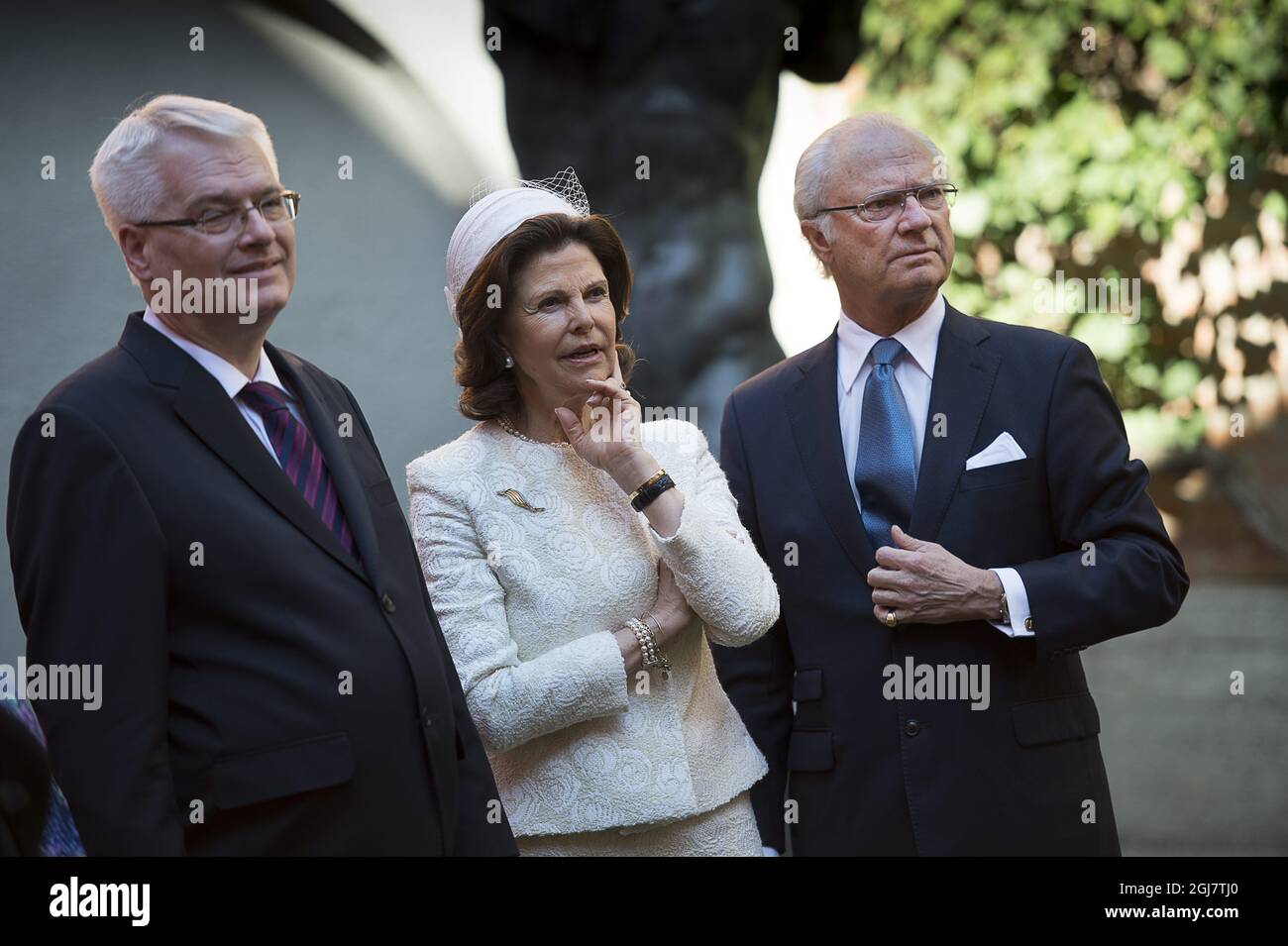 Croatia's President Ivo Josipovic , Swedish Queen Silvia and King Carl Gustaf a the Mestrovic museum in Zagreb, Croatia on April 16, 2013. The Swedish King and Queen are on a three-day official visit to Croatia.   Stock Photo