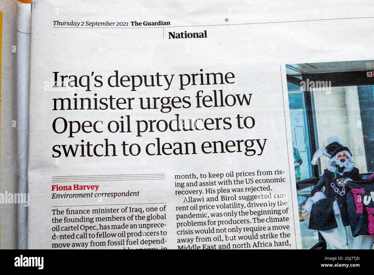 'Iraq's deputy prime minister urges fellow Opec oil producers to switch to clean energy' Guardian newspaper headline article September 2021 London UK Stock Photo