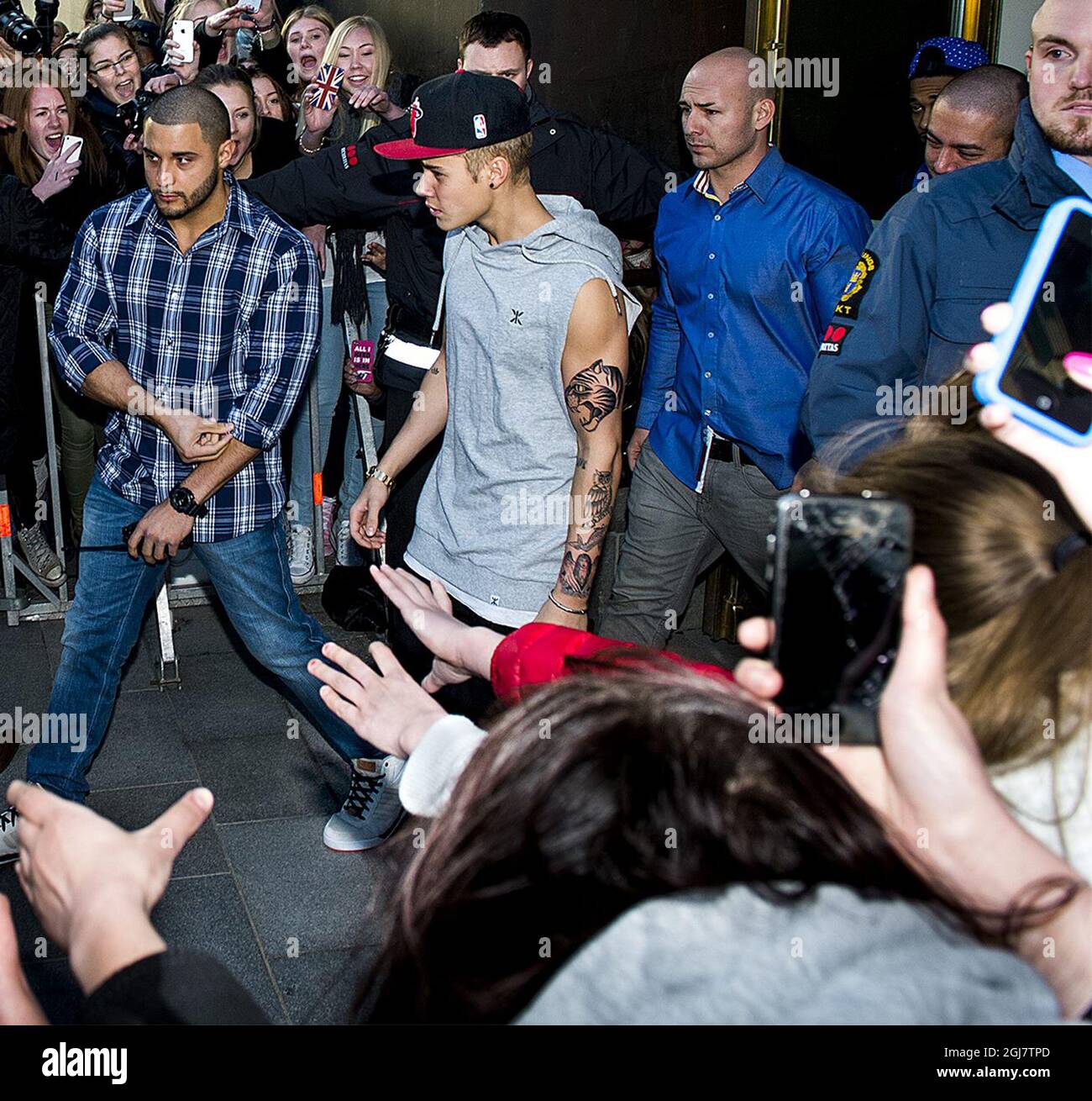 Justin Bieber leaves the Grand Hotel in Stockholm, Sweden, April 23, 2013.  According to Swedish paper Aftonbladet two of the tattoos on Bieber's left  arm are new and made during the night, image size:1300x1310
