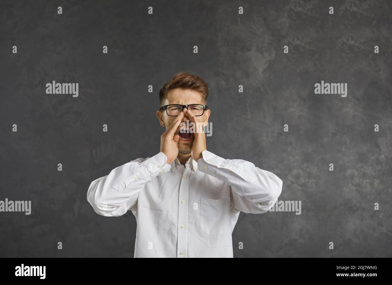 Portrait of man shout announce good sale deal Stock Photo