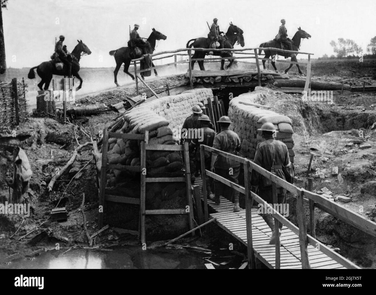 FILE 1914-1918. Picture from World War One. British cavalry passes a bridge across a trench. Stock Photo