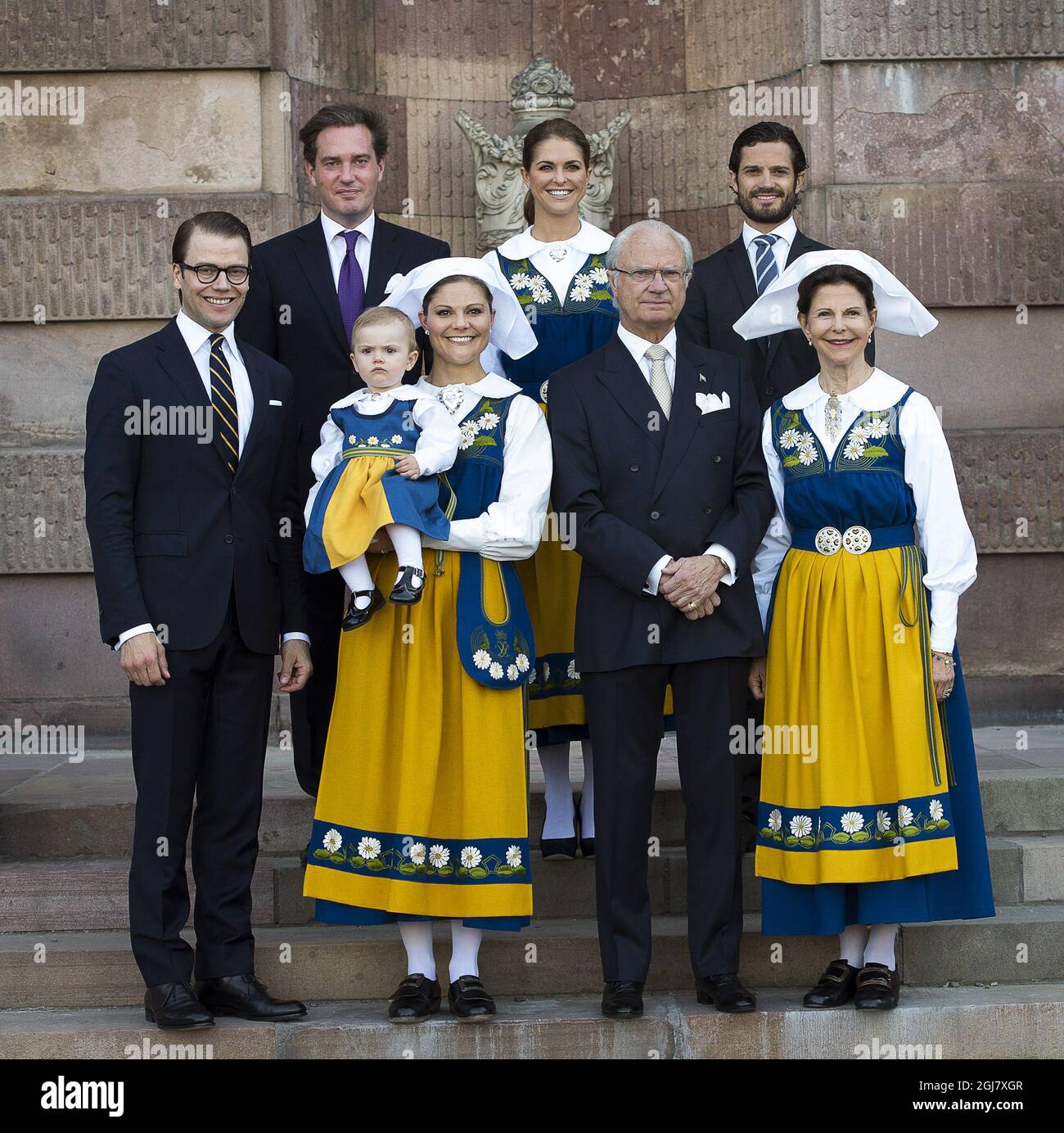 Family photo of L-R: Prince Daniel, Christopher O'Neill, Princess Estelle, Crown Princess Victoria, Princess Madeleine, King Carl Gustaf, Prince Carl Philip and Queen Silvia during the Swedish National Day celebrations at the Royal Palace in Stockholm, Sweden, June 6, 2013.    Stock Photo