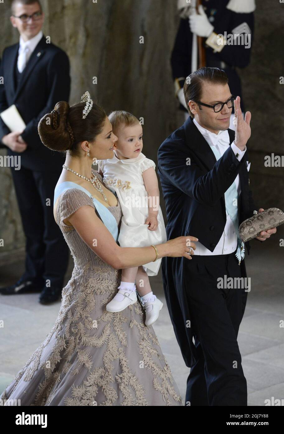 STOCKHOLM 20130608 Crown Princess Victoria, Prince Daniel and Princess Estelle arrive for the wedding of Princess Madeleine of Sweden and Mr Christopher OÂ’Neill held at the Royal Chapel at the Royal Palace of Stockholm on Saturday June 8, 2013. Foto: Tobias Rostlund / SCANPIX / kod 1014  Stock Photo