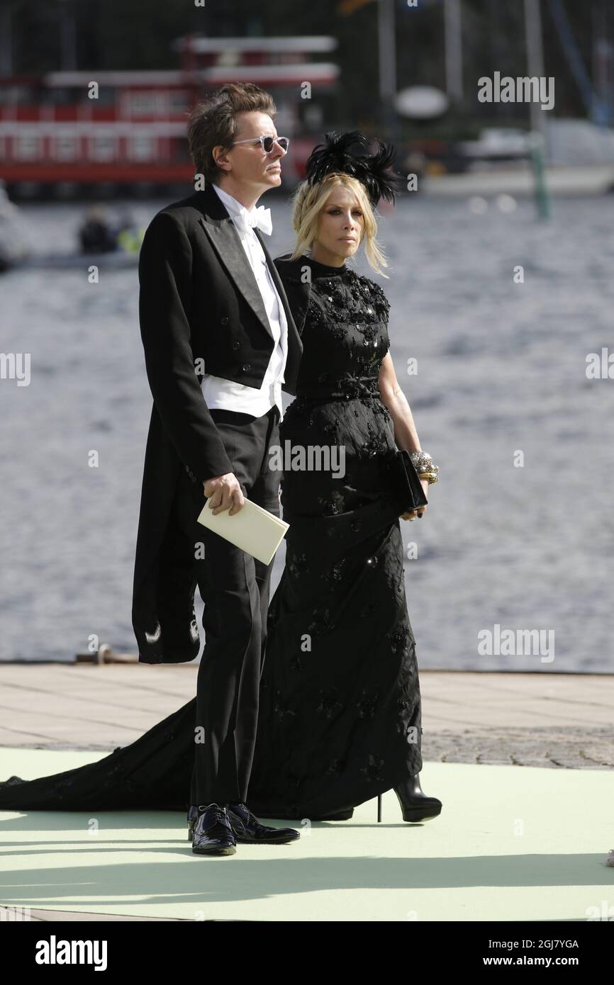 STOCKHOLM 20130608 John Taylor, from Duran Duran, and wife Gela Nash arriving at Evert Taubes Terrass at Riddarholmen in Stockholm to Drottningholm Palace where the wedding dinner will take place on June 8, 2013. Foto: Adam Ihse / SCANPIX / kod 9200  Stock Photo