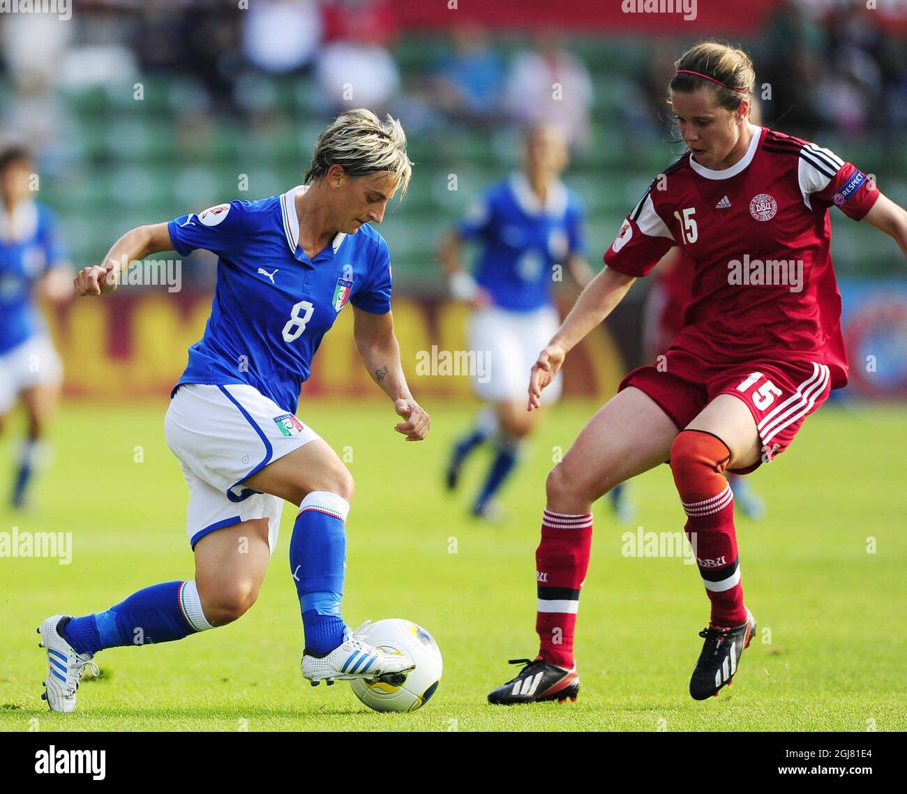 HALMSTAD 2013-07-13 Italy's Melania Gabbiadini, left, vies with Denmark's Sofie Pedersen during the UEFA Women's EURO 2013 group A soccer match between Denmark and Italy at Orjans vall in Halmstad, Sweden, on July 13, 2013. Photo: Bjorn Lindgren / SCANPIX / code 9204  Stock Photo