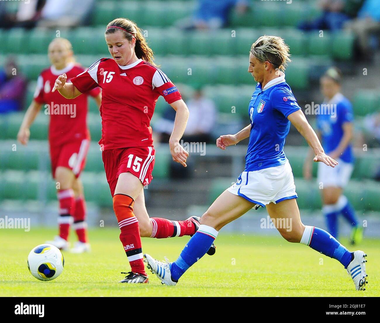 HALMSTAD 2013-07-13 Denmark's Sofie Pedersen, left, fights for the ball with Italy's Melania Gabbiadini during the UEFA Women's EURO 2013 group A soccer match between Denmark and Italy at Orjans vall in Halmstad, Sweden, on July 13, 2013. Photo: Bjorn Lindgren / SCANPIX / code 9204  Stock Photo