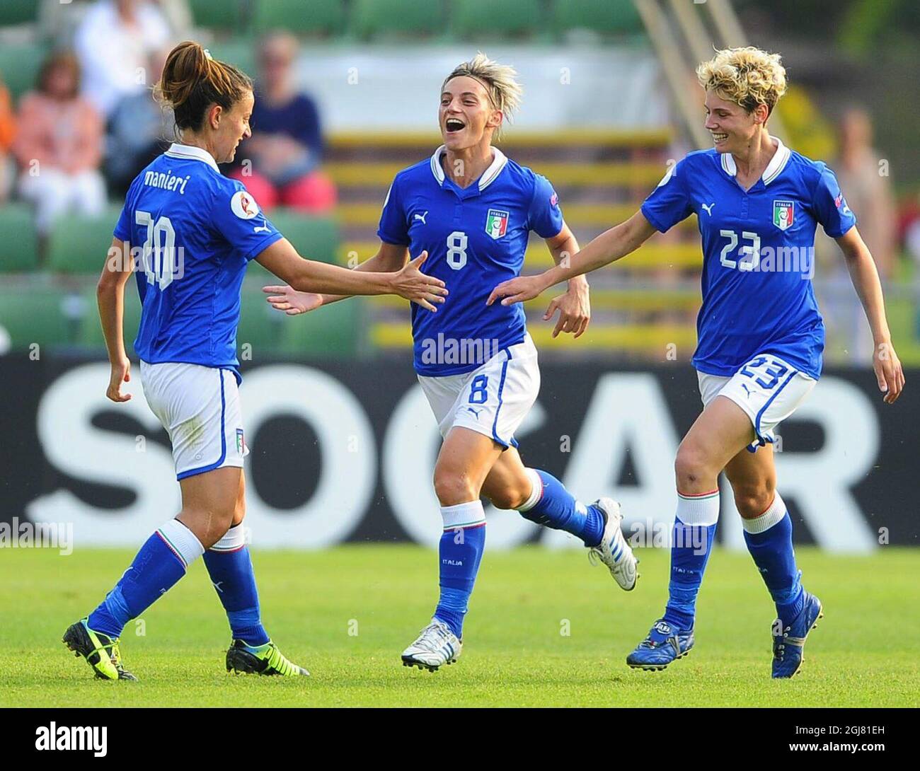 HALMSTAD 2013-07-13 Italy's Melania Gabbiadini, center, celebrates with team mates Raffaella Manieri (, left, and Cecilia Salvai after scoring the team's first goal during the UEFA Women's EURO 2013 group A soccer match between Denmark and Italy at Orjans vall in Halmstad, Sweden, on July 13, 2013. Photo: Bjorn Lindgren / SCANPIX / code 9204  Stock Photo