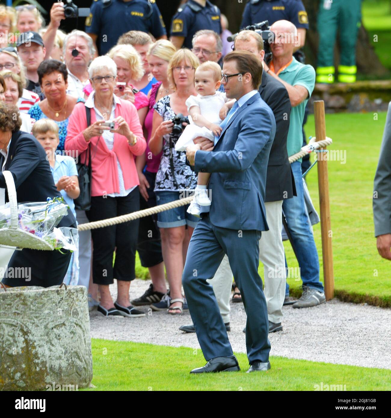 BORGHOLM 20130714 Swedish Prince Daniel with his daugter Princess Estelle, at the courtyard of the royal family's summer residence Solliden, on the island of Oeland, Sweden, on July 14, 2012, during the celebrations of Crown Princess Victorias 36th birthday. Photo: Jonas Ekstromer / SCANPIX / code 610030  Stock Photo